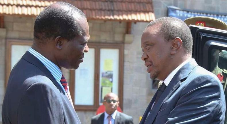 Former Jubilee Secretary General  Raphael Tuju and President Uhuru Kenytta (Courtesy)