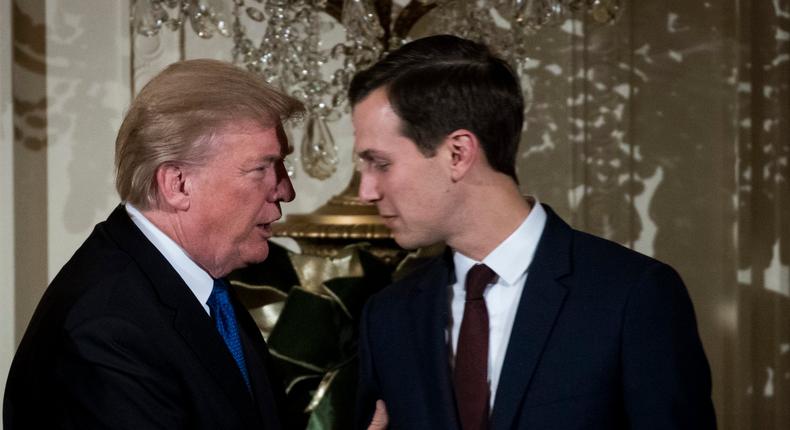 WASHINGTON, DC - DECEMBER 7: (L to R) U.S. President Donald Trump talks with White House Senior Advisor to the President Jared Kushner as they attend a Hanukkah Reception in the East Room of the White House, December 7, 2017 in Washington, DC. Hanukkah begins on the evening of Tuesday, December 12 this year. (Drew Angerer/Getty Images)