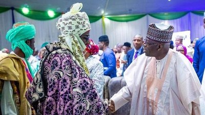 President Bola Tinubu exchanging handshake with former Emir of Kano State, Sanusi Lamido Sanusi. [Twitter:@EzumaAndre2745]