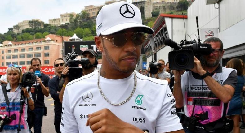 Mercedes' British driver Lewis Hamilton arrives in the pits during the second practice session at the Monaco street circuit, on May 25, 2017, ahead of the Monaco Formula One Grand Prix