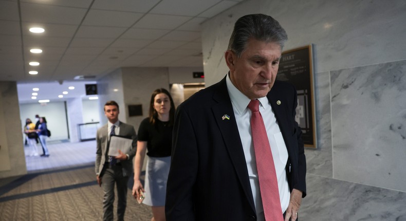 Sen. Manchin heads to a vote on Capitol Hill in May 2022.