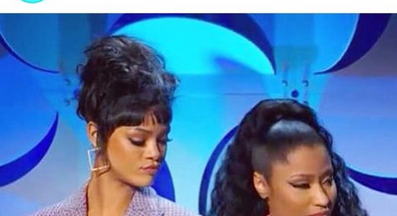 Rihanna peeps through Nicki Minaj's exposed cleavage