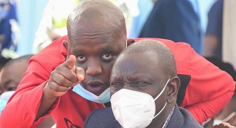 File image of Dennis Itumbi pictured with President William Ruto