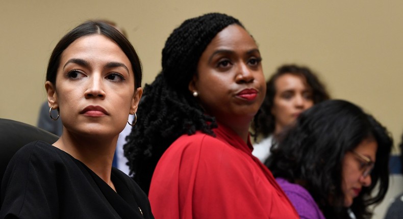 Rep. Alexandria Ocasio-Cortez, D-N.Y., left, Rep. Ayanna Pressley, D-Mass., center, and Rep. Rashida Tlaib, D-Mich., right, attend a House Oversight Committee hearing on Capitol Hill in Washington, Monday, July 15, 2019, on White House counselor Kellyanne Conway's violation of the Hatch Act. (AP Photo/Susan Walsh)