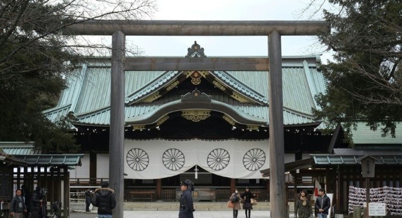 People visit Tokyo's Yasukuni Shrine, which honours millions of Japanese war dead but also senior military and political figures convicted of war crimes after World War II