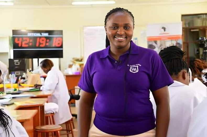 Rose Tata Wekesa, the Kenyan teacher who has broken records by conducting the longest science class ever, lasting for 62 hours, 33 minutes, and 34 seconds.