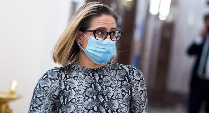 Sen. Kyrsten Sinema, D-Ariz., arrives for a Senate Homeland Security and Governmental Affairs Committee markup in Dirksen Building on Wednesday, October 6, 2021.
