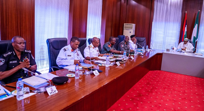 President Muhammadu Buhari in a meeting with service chiefs (Punch)