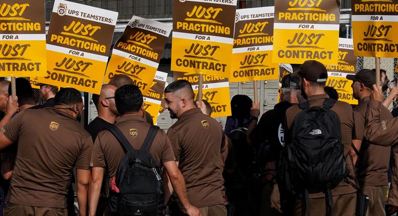 UPS workers walked a 'practice picket line' on July 7, 2023, in the Queens borough of New York City, ahead of a possible UPS strike.Timothy A. Clary/AFP via Getty Images