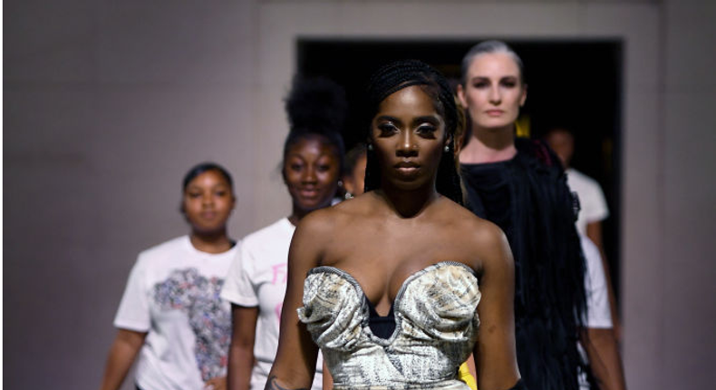 Tiwa Savage hits the runway for Naomi Campbell's #FashionForRelief style showcase [Credit: JiveNaija]