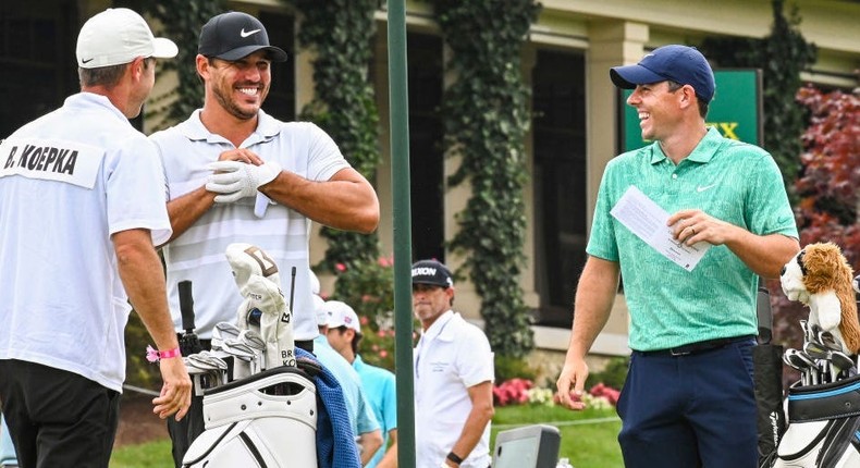 Brooks Koepka and Rory McIlroy smile on the first tee during the first round of the Memorial Tournament on July 16, 2020Keyur Khamar/PGA TOUR via Getty Images