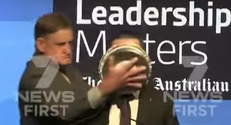 Qantas CEO Alan Joyce got a pie shoved in his face on Tuesday.