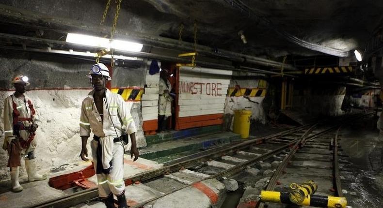 Miners are seen underground at Lonmin Plc's Karee mine in Marikana, Rustenburg 100 km (62 miles) northwest of Johannesburg, March 5, 2013.   REUTERS/Siphiwe Sibeko