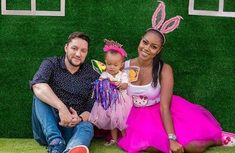 Jamie Roberts and Yvonne Nelson with their daughter
