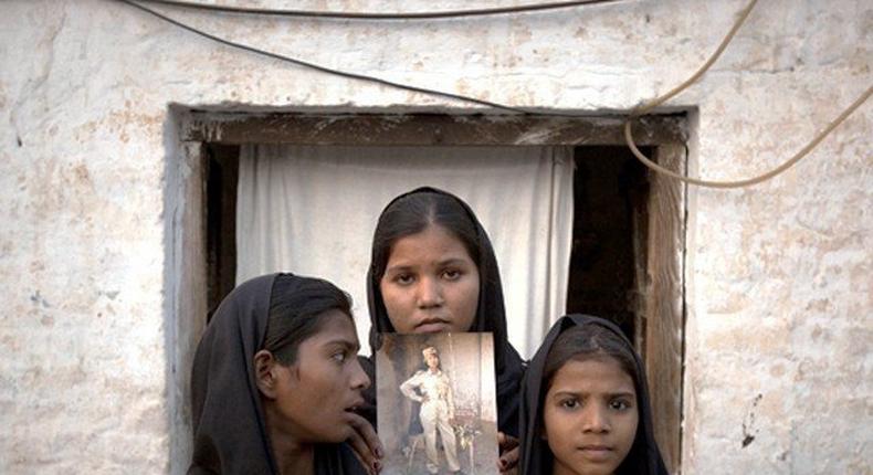 Asia Bibi's children show off her picture