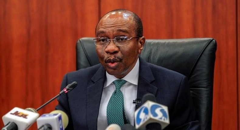 Nigeria's central bank Governor Godwin Emefiele speaks during the monthly Monetary Policy Committee meeting in Abuja, Nigeria.