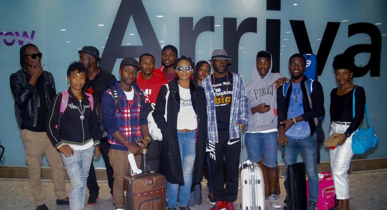 Yemi Alade and her band arrive London Airport in preparation for the Dance Afrique Summerfest 2015