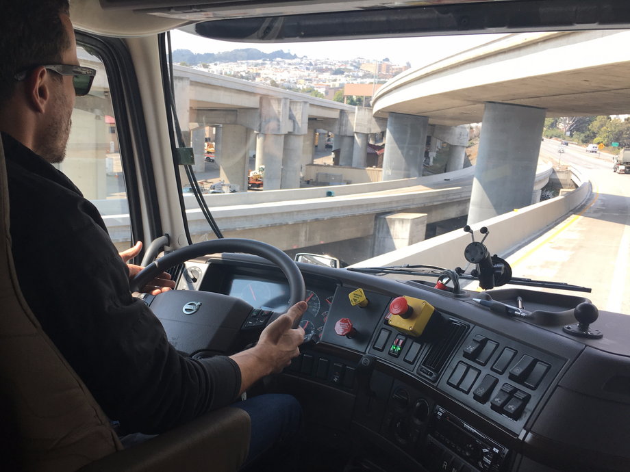 Grigsby's hands hover in case he needs to grab the wheel as Otto navigates a section of interstate with a lot of crossing bridges.