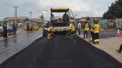Picture showing officials of the Lagos State Public Works Corporation (LSPWC) during road rehabilitation in the Iju area of the state. [PM News]