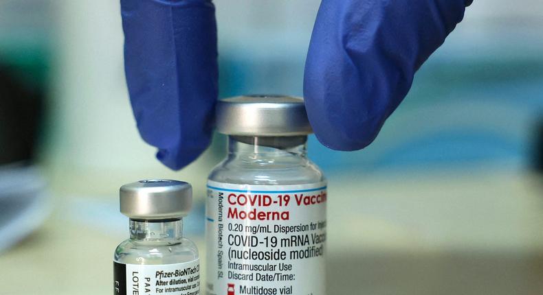 Vials of the Moderna and Pfizer COVID vaccines are seen above in Israel.