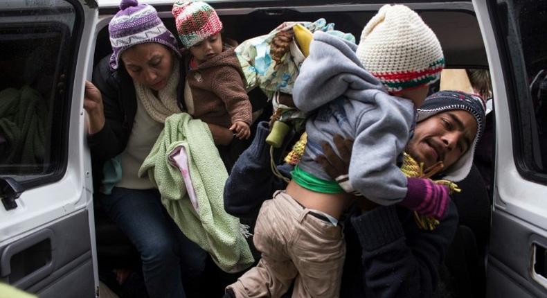 Central American refugees wait near the US-Mexico border as they seek asylum in the United States