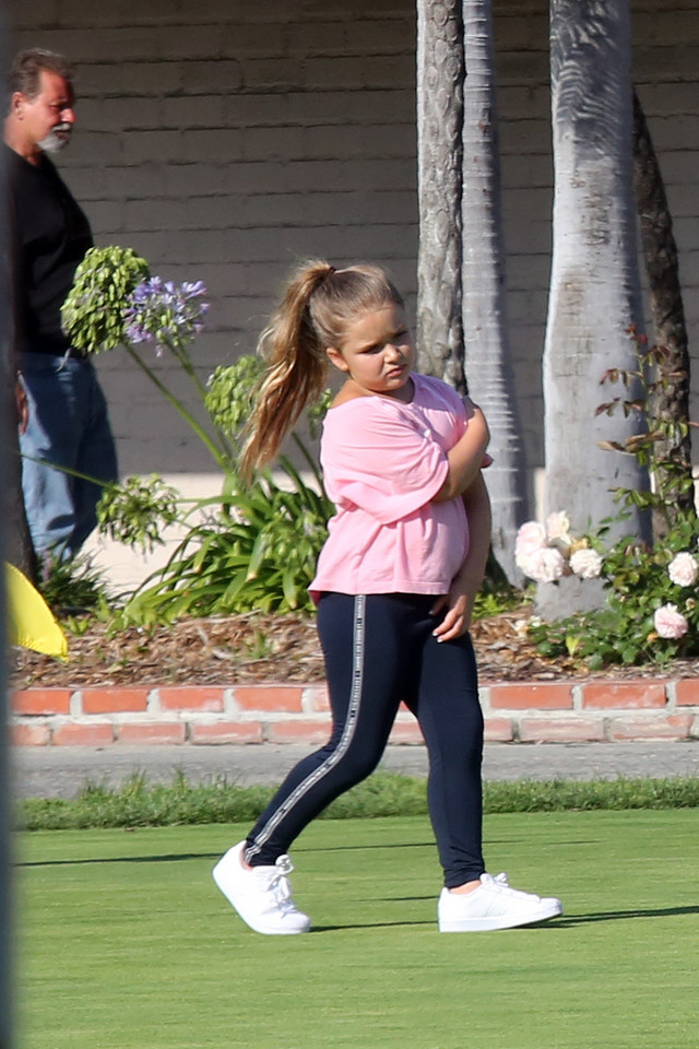 David Beckham z dziećmi na polu golfowym