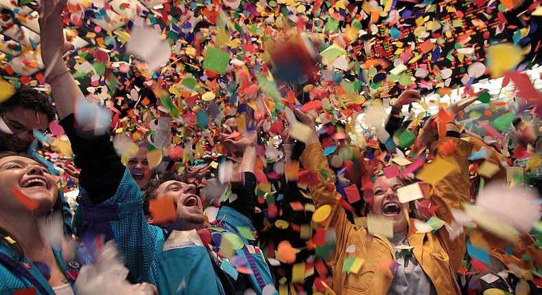 Traders and clerks at the CME Group toss confetti. Scott Olson/Getty Images
