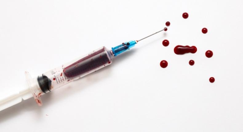 Syringe and blood