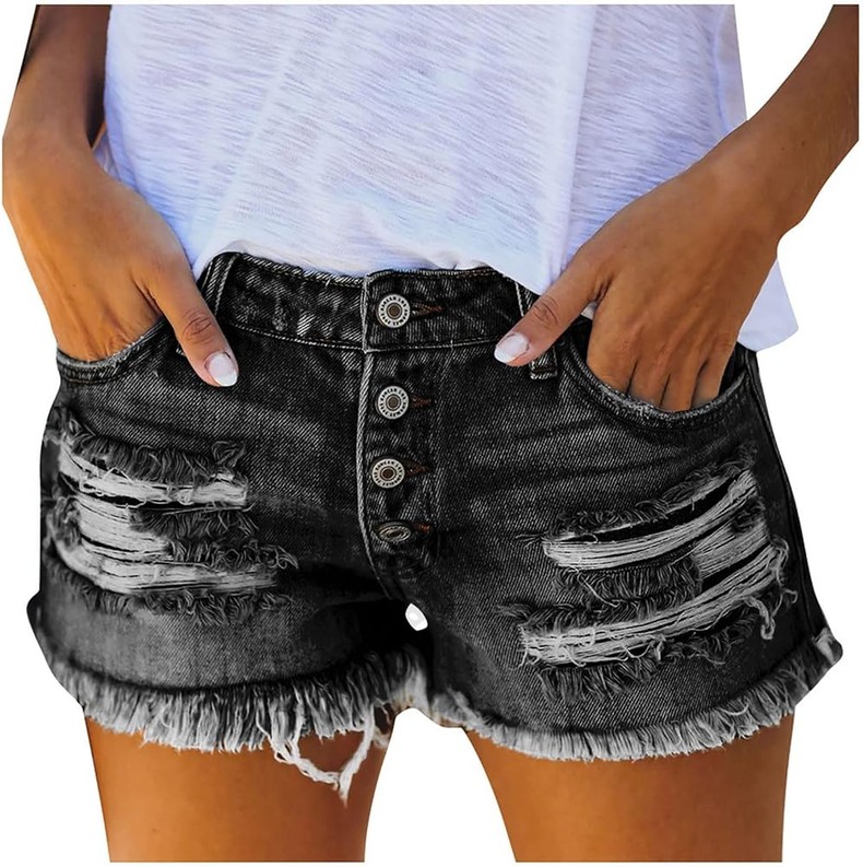 A lady  in ripped shorts