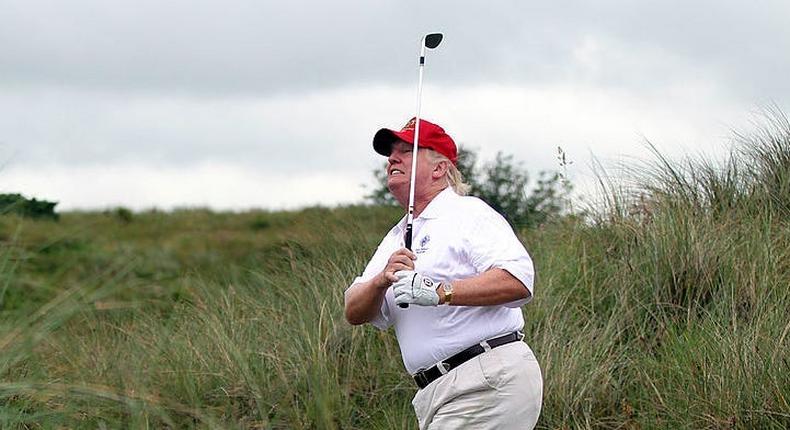 Then-future President Donald Trump plays golf in 2012.
