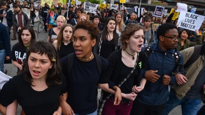 BALTIMORE, MD - MAY 1: Protesters lock arms during a Black Live