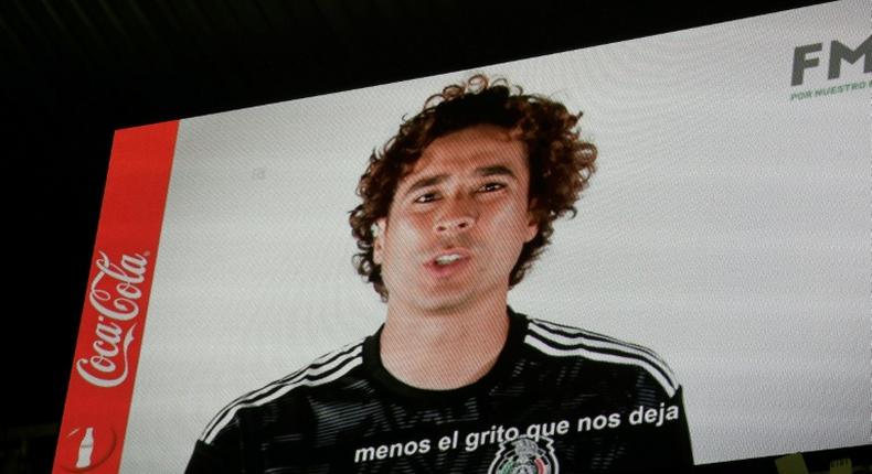 Mexican goalkeeper Guillermo Ochoa speaks out against homophobic chants in a message screened at the Azteca Stadium in Mexico City on October 15, 2019