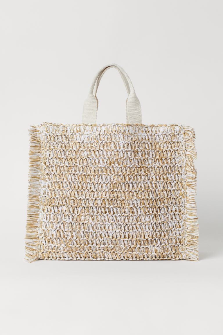 Cabas en paille de papier de H&M pour CHF 29.95. 