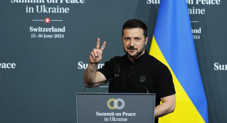 Ukraine's President Volodymyr Zelenskyy flashes a V sign in  Lucerne, Switzerland, on June 16, 2024.DIMITAR DILKOFF via Getty Images