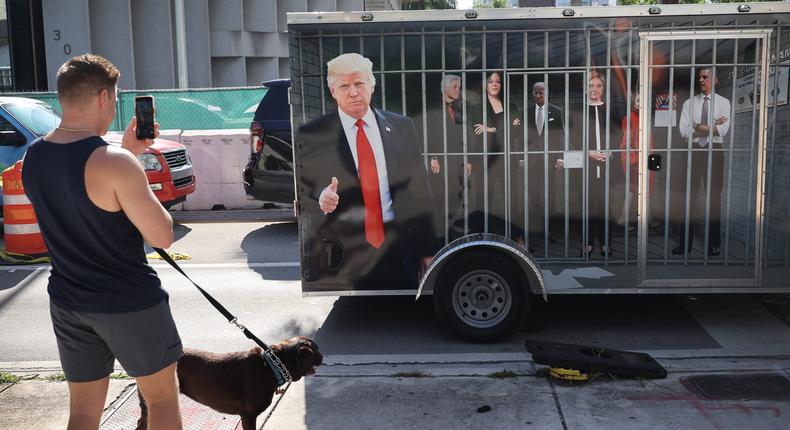 A supporter of former President Donald Trump pulls a trailer outside the Wilkie D. Ferguson Jr. courthouse in Miami.Scott Olson/Getty Images