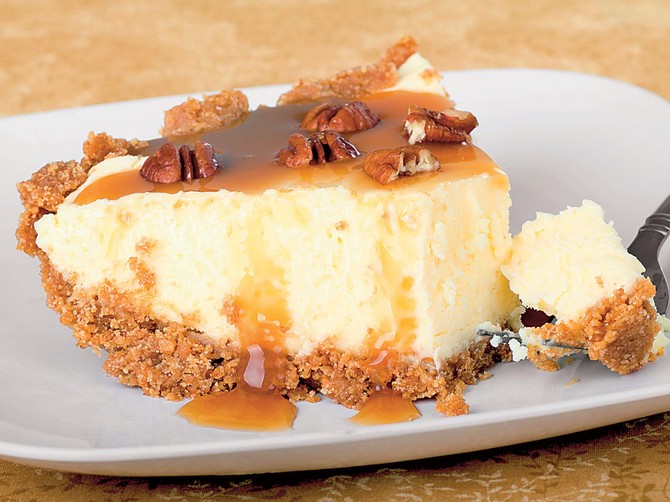 33232_Brza-torta-stock-photo-slice-of-cheesecake-with-caramel-sauce-and-pecans-60481615