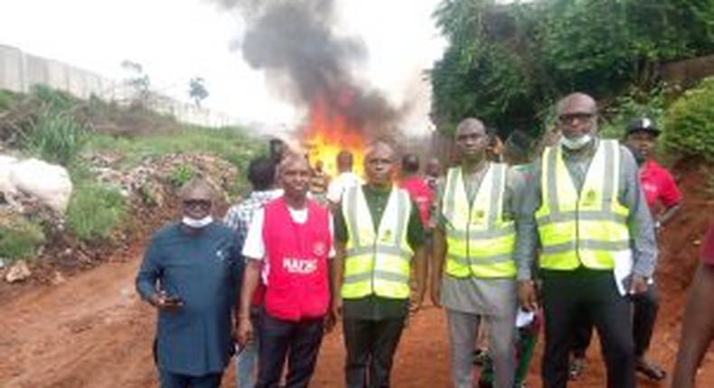 NAFDAC officials at the destruction of fake products from Southeast, South South in Awka. [NAN]