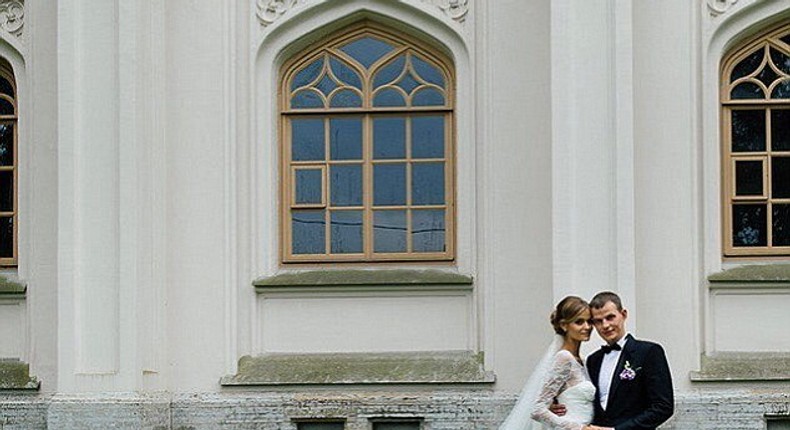 Model Kate Grigorieva couldn't have looked more angelic as she wore white for her wedding in Russia on Sunday to her soldier husband Alexander 