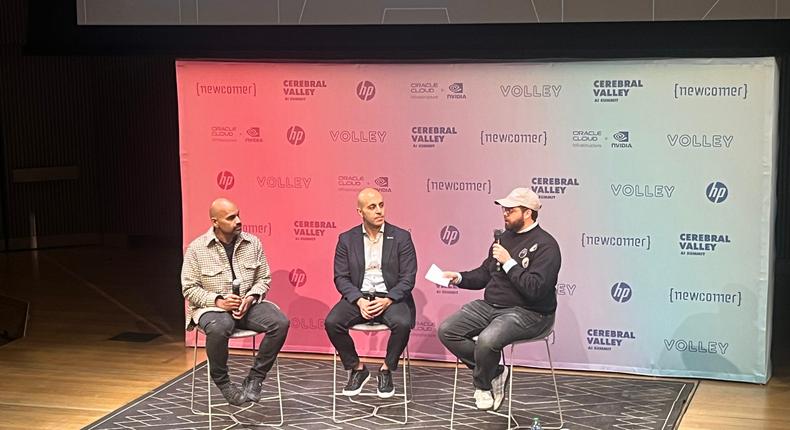 MosaicML Co-founder Naveen Rao and Databricks CEO Ali Ghodsi speaking to journalist Eric Newcomer at the Cerebral Valley AI SummitDarius Rafieyan/Business Insider
