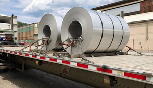 A trailer transporting steel coils