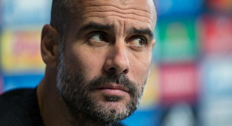 Manchester City's Spanish manager Pep Guardiola addresses the media during a press conference ahead of their UEFA Champions League match against Barcelona