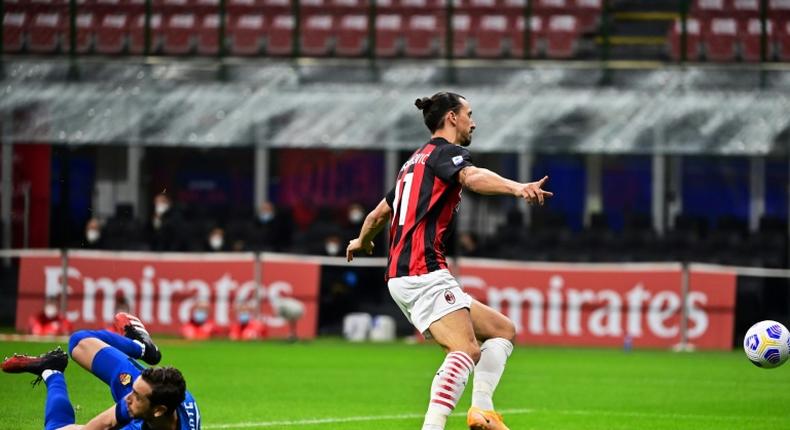 Double quick: AC Milan's Zlatan Ibrahimovic celebrated as the ball bounced into Antonio Mirante's net in the second minute