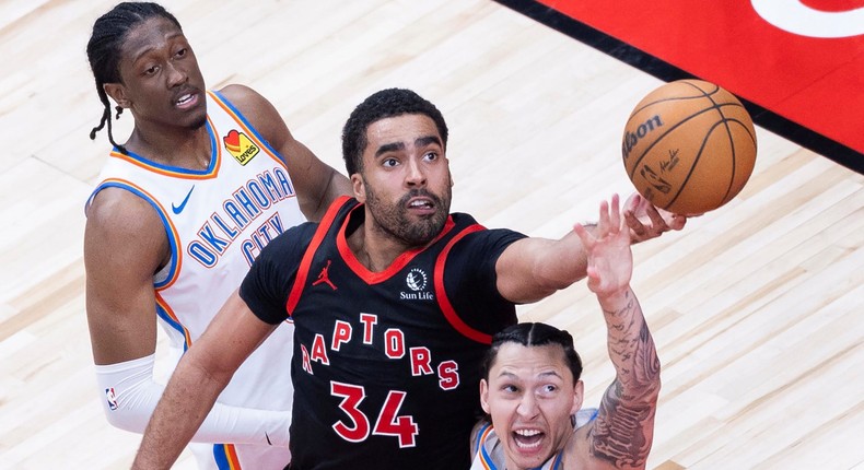 Jontay Poter (center) in a March 22 NBA game.Photo by Zou Zheng/Xinhua via Getty Images