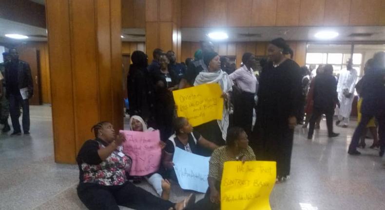 National Assembly workers protest unpaid salaries and allowances as plenary resumes.