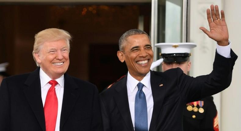 Barack Obama (right) pictured with Donald Trump at the White House in Washington, DC on January 20, 2017