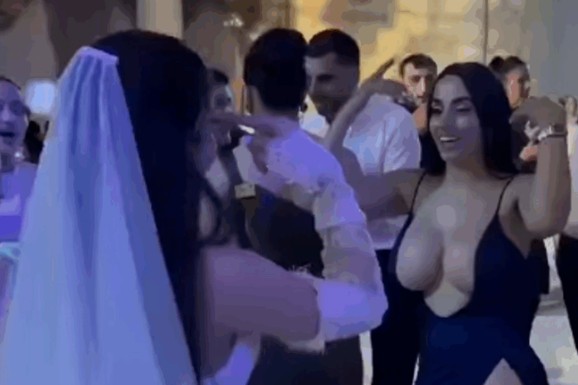 BAREM NIJE U BELOM Snimak sa balkanske svadbe HIT na mrežama! Gošća došla u izazovnoj haljini i šokirala sve: "Mladoženja se istog dana oženio i razveo" (VIDEO)