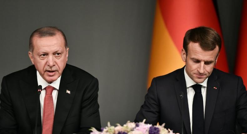 Turkish President Recep Tayyip Erdogan (L, pictured October 2018) told French President Emmanuel Macron he was still a political noice and should first learn the history of [his] country