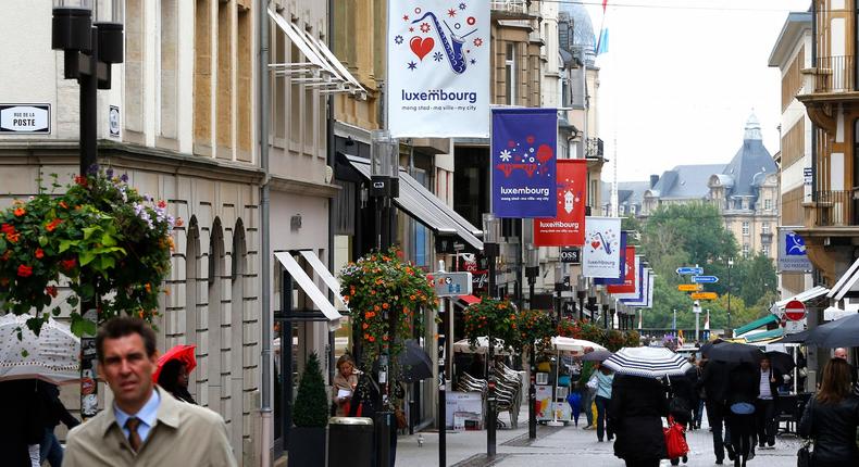 Pedestrians walk through the city center in Luxembourg.