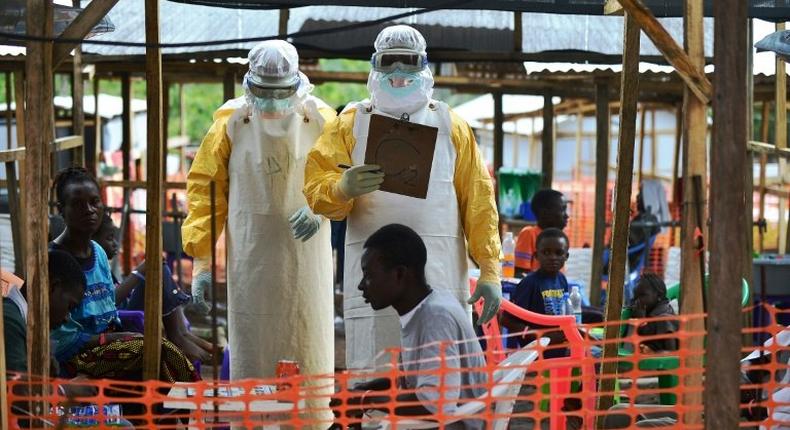 Medical workers monitoring patients at the height of the Ebola crisis in 2014