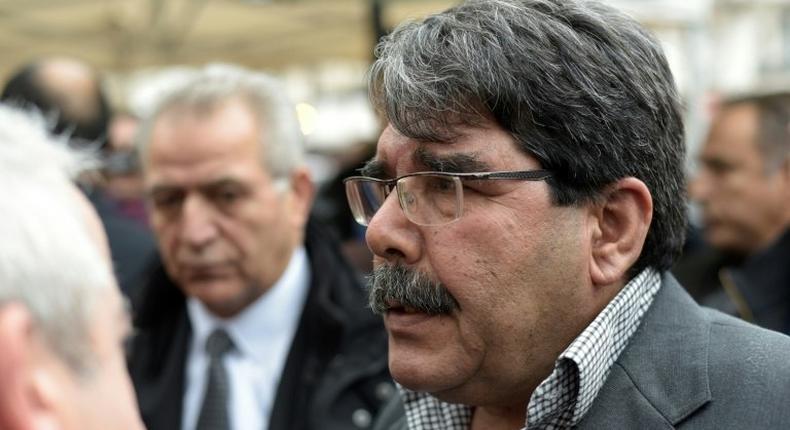 Salih Muslim, chairman of the PYD, arrives on November 17, 2015 to pay tribute to the victims of the Paris attacks